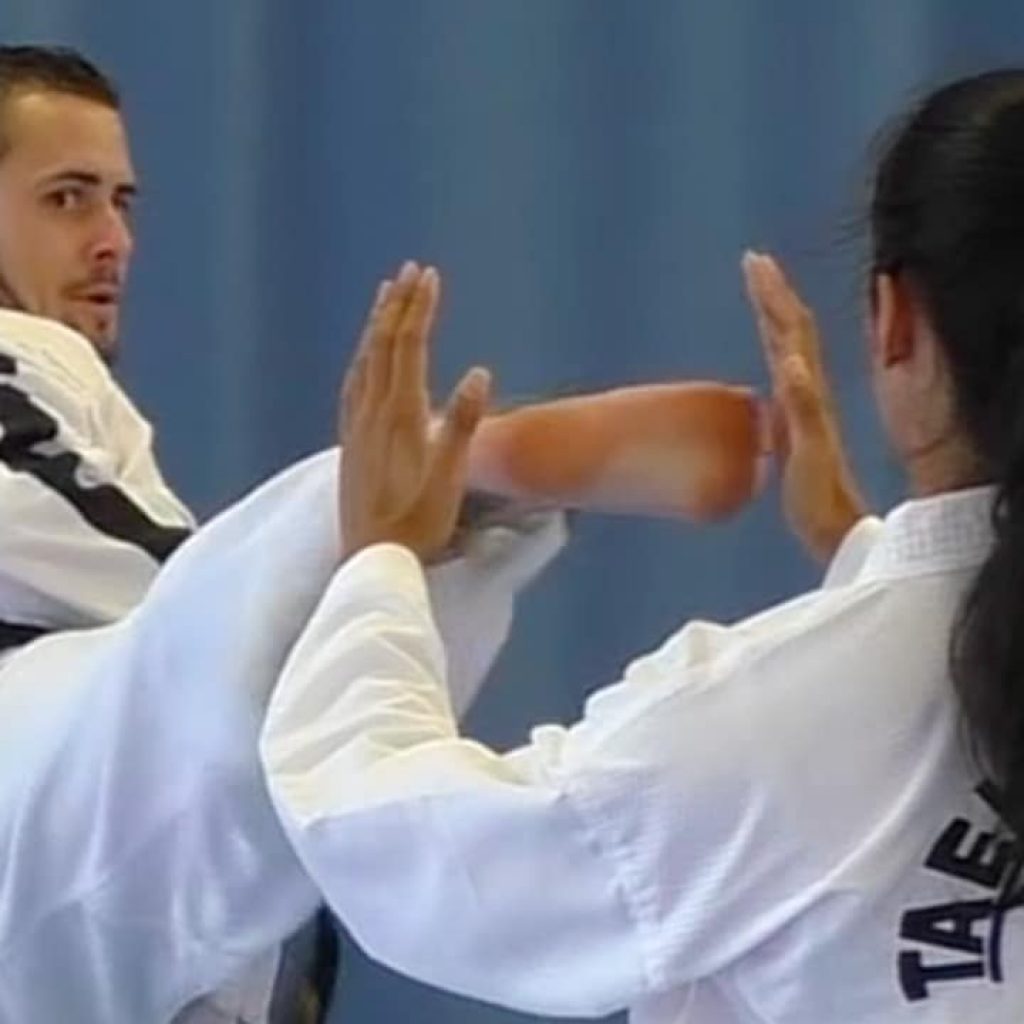 Master Mark Trotter explaining Ge-Baek pattern techniques in 1st dan training