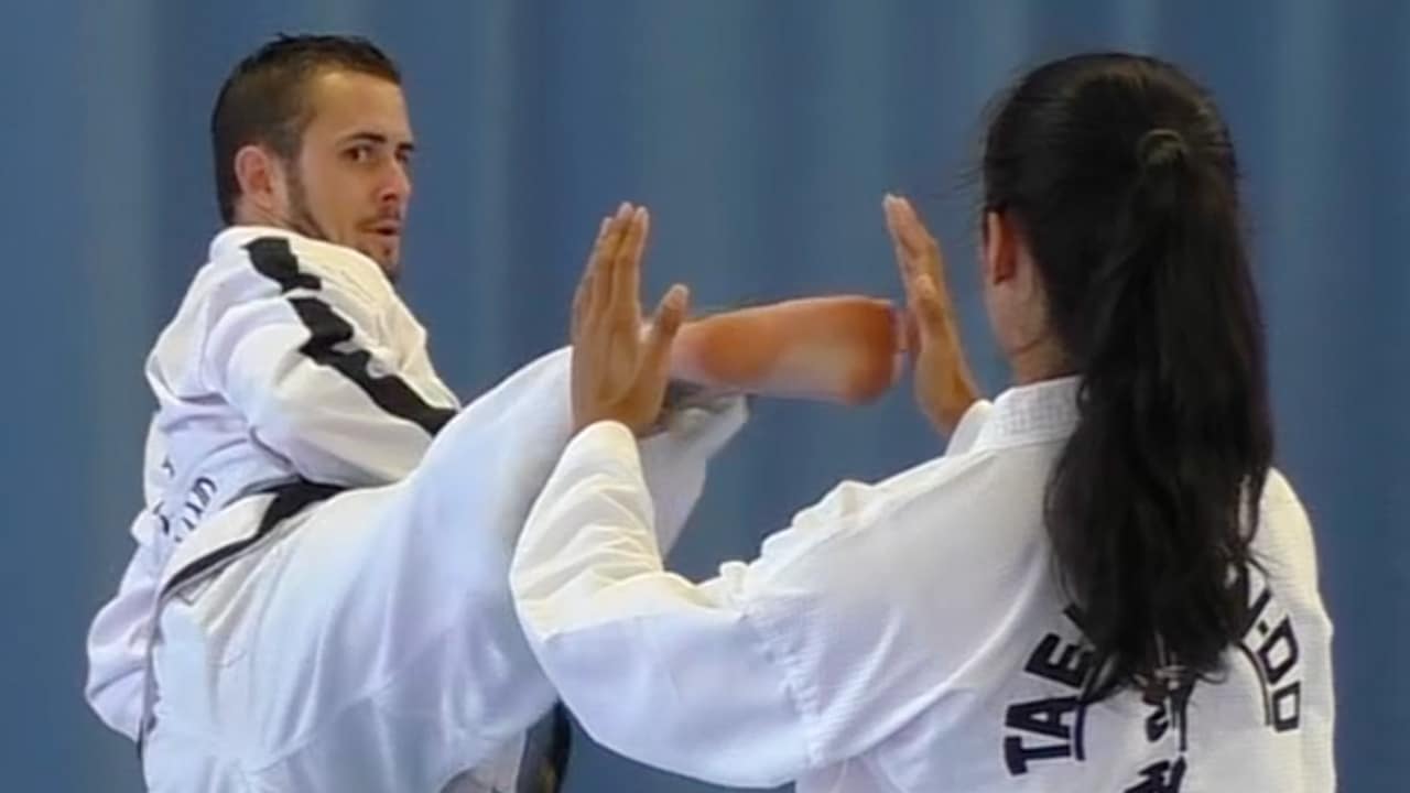 Master Mark Trotter explaining Ge-Baek pattern techniques in 1st dan training