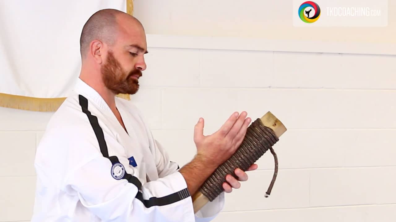 Taekwon-Do breaking training showing hand and foot conditioning