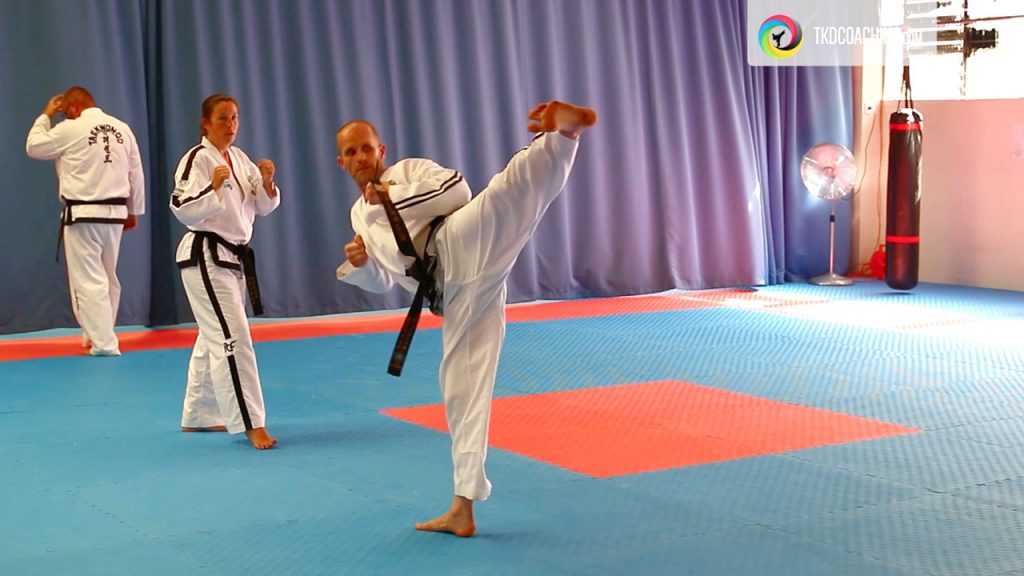 ITF Taekwon-Do practitioner performing a high kicking technique during a patterns lesson with Master Mark Hutton