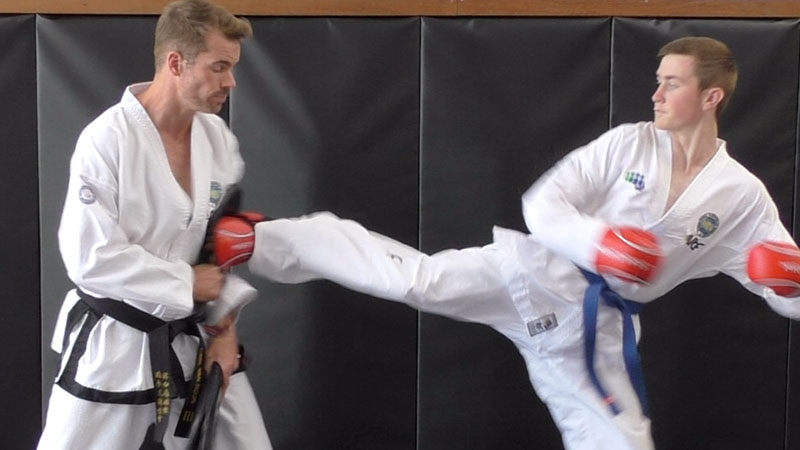 ITF Taekwon-Do instructor demonstrating basic sparring framework concepts