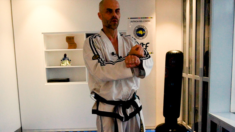 Master Mariusz Steckiewicz demonstrating backward motion during a Taekwon-Do training session