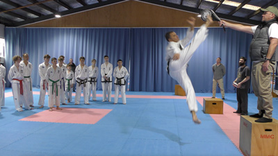Jon Sawden coaching competition special techniques and flying kicks