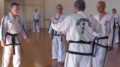 Master Gray Patterson teaching multiple opponents self defence instruction